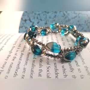 Blue and silver tone bracelet  with hrinstones